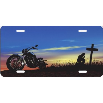 Kneeling Prayer With Motorcycle License Plate