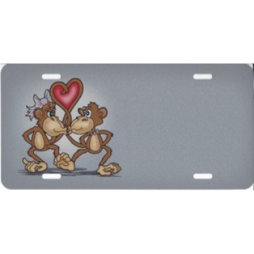 Monkeys Kissing On Silver License Plate 